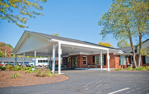 A well-designed facility with a welcoming entrance and spacious outdoor area.