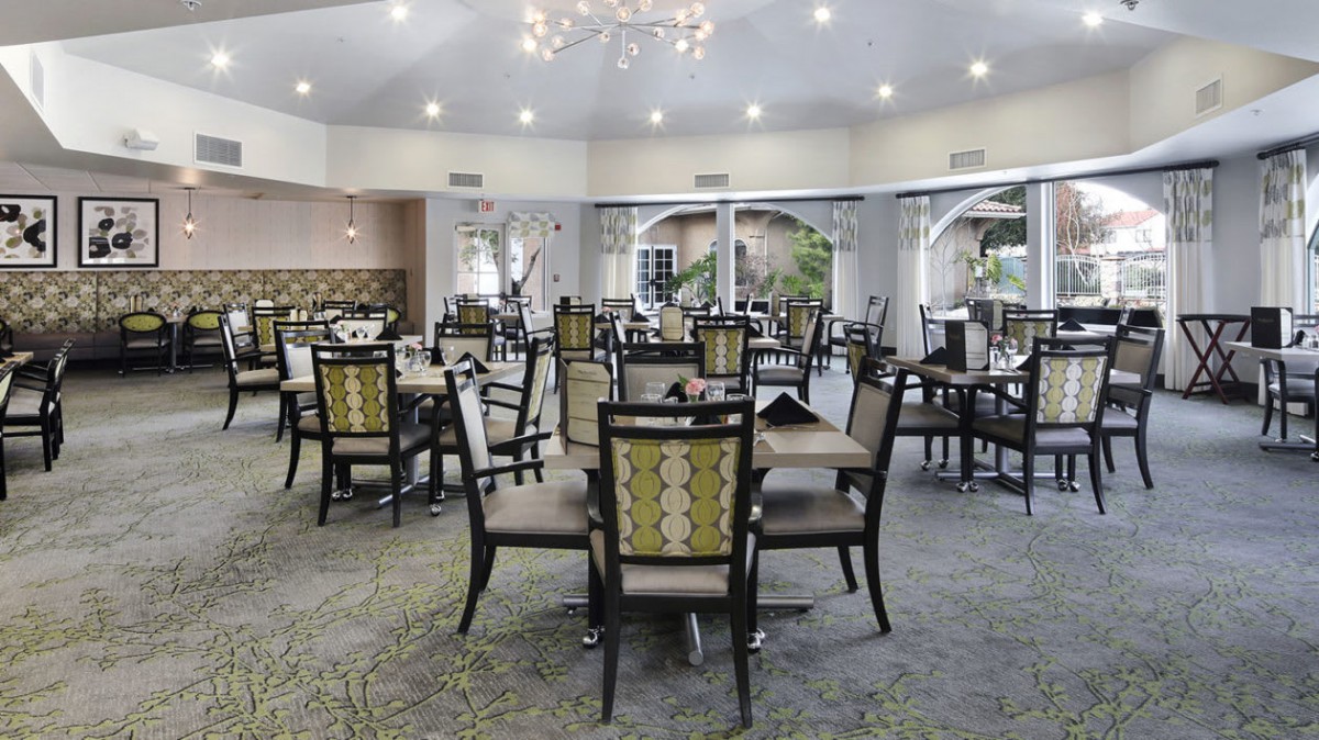 Spacious restaurant dining area with elegant decor and ample seating.