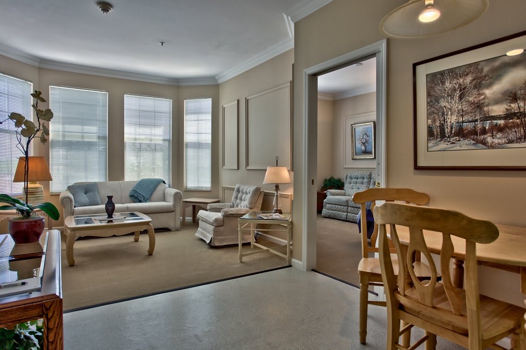 A cozy living room with comfortable seating and natural light.