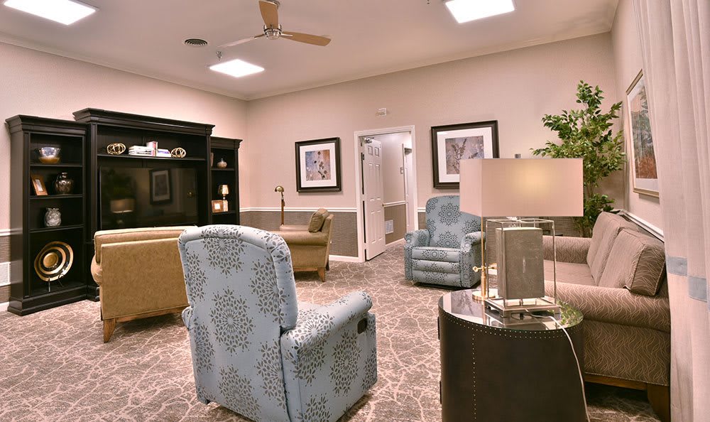 A cozy living room with comfortable seating and warm decor.