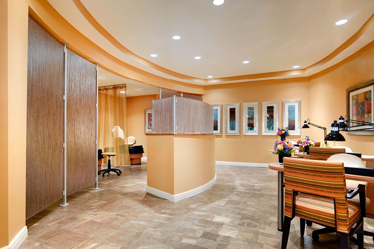 A modern reception area with warm lighting and stylish decor.