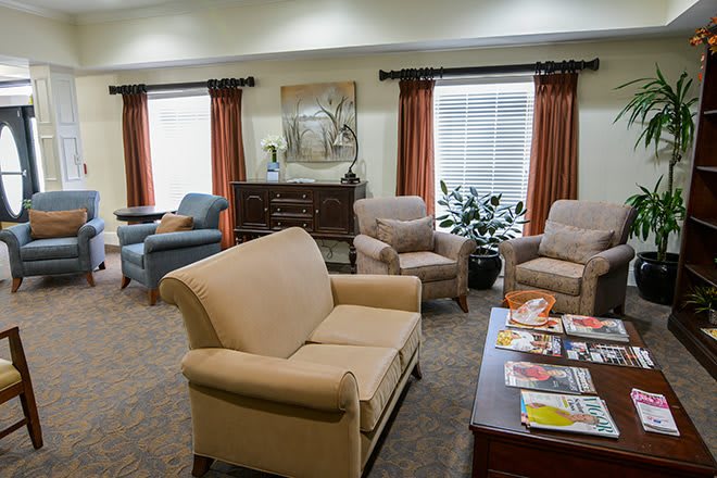 A cozy living room with comfortable seating and tasteful decor.