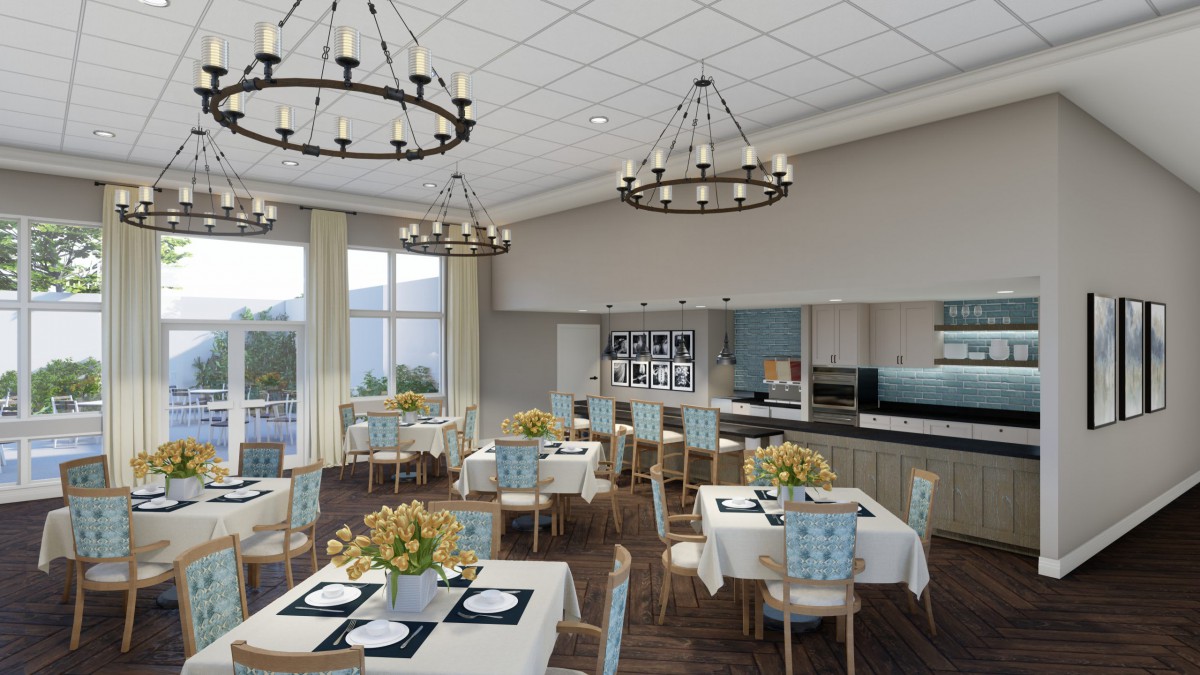 An elegantly decorated restaurant interior featuring chandeliers, tables set with dishware, and a sophisticated dining atmosphere.