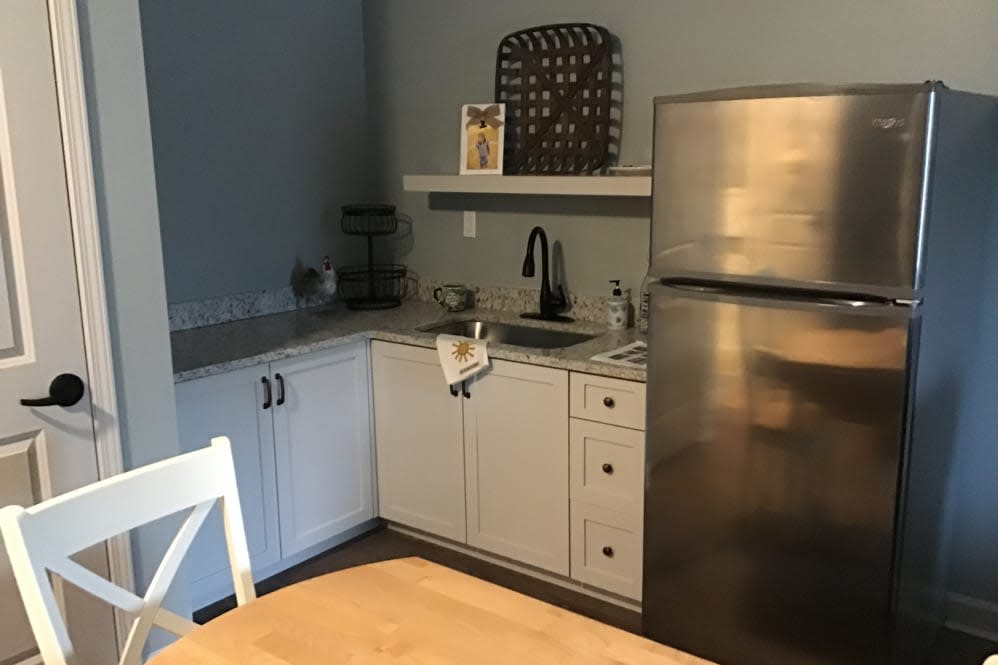 Cozy kitchen with modern appliances and ample counter space.