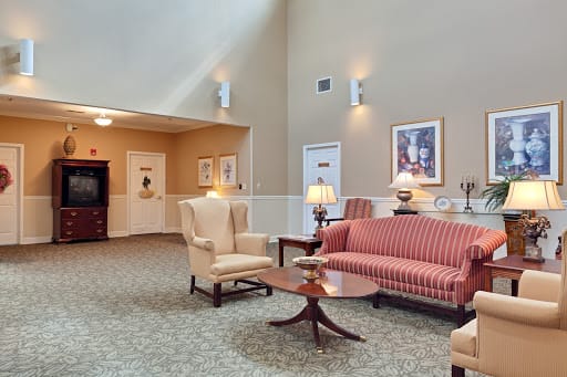 A cozy lobby area with comfortable seating and elegant decor.
