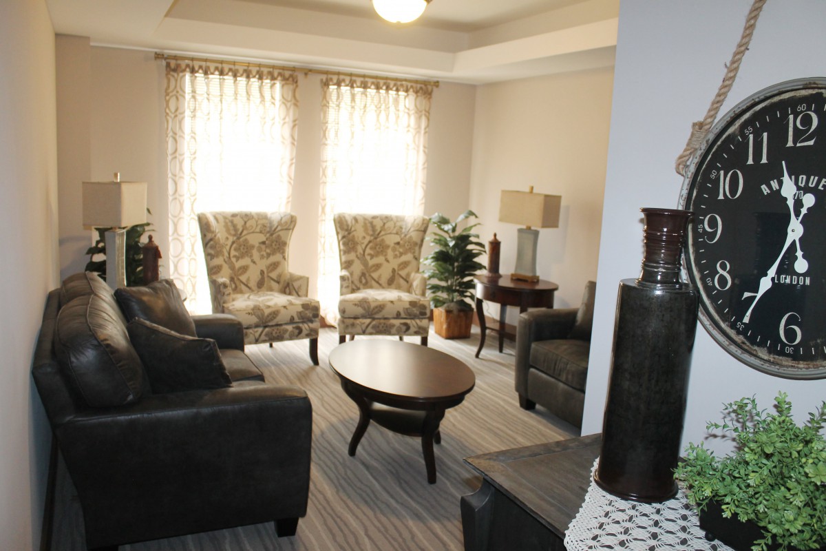 A cozy living room with elegant furniture and soft lighting.