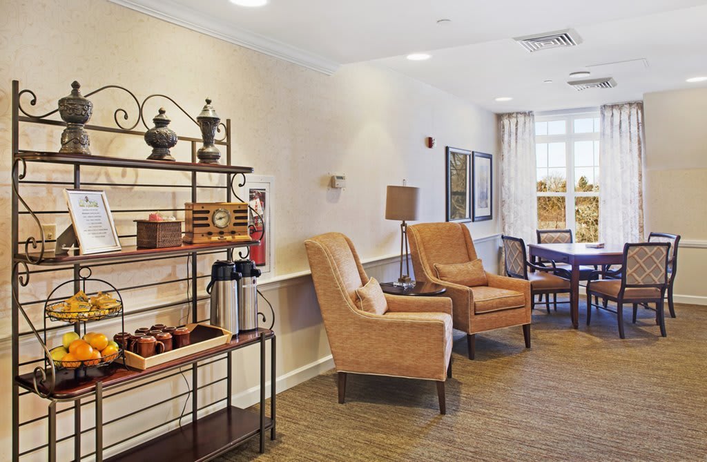 A comfortable seating area with cozy chairs and tasteful decor.
