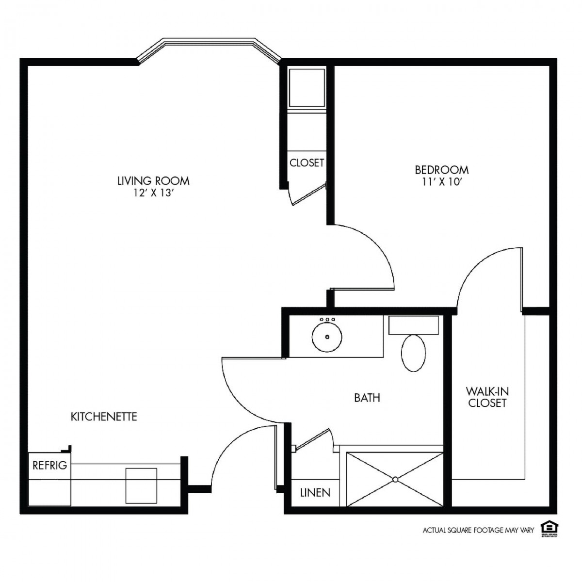 A floor plan of a one-bedroom apartment featuring a living room, kitchen, bathroom, and storage space.