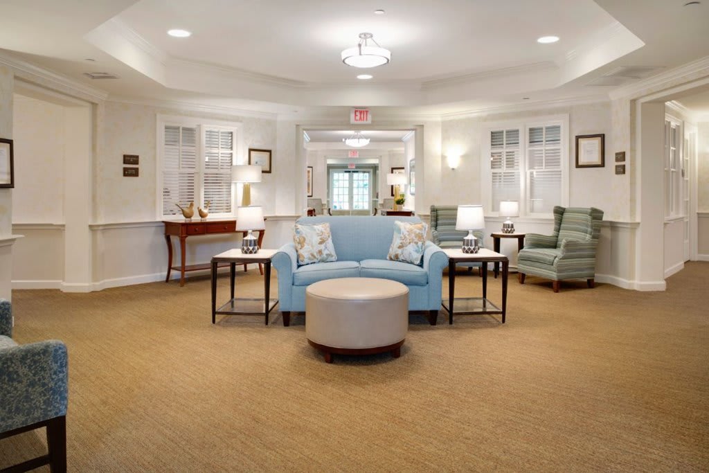 A modern lobby with comfortable seating and ambient lighting.
