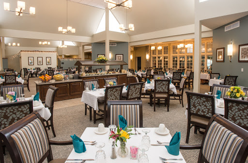 A well-decorated dining area featuring elegant furniture and inviting decor.