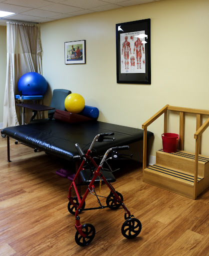 A therapy room equipped with exercise tools and rehabilitation aids for patient recovery.