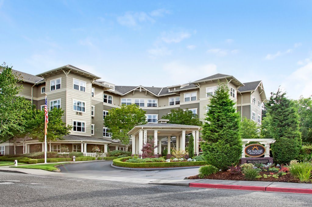 A well-maintained residential building with landscaped surroundings and a welcoming entrance.