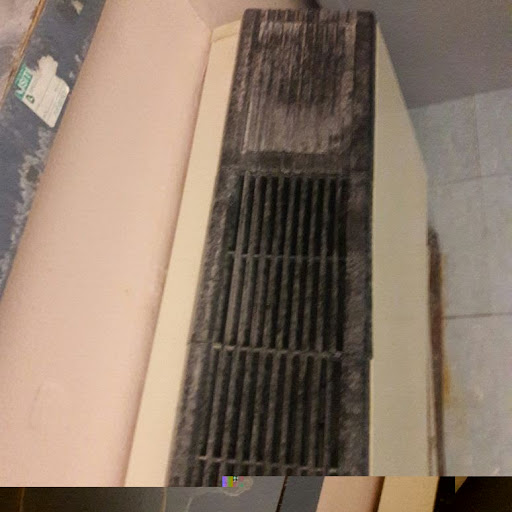 A neglected air conditioning unit with noticeable dust buildup, indicating the need for cleaning.