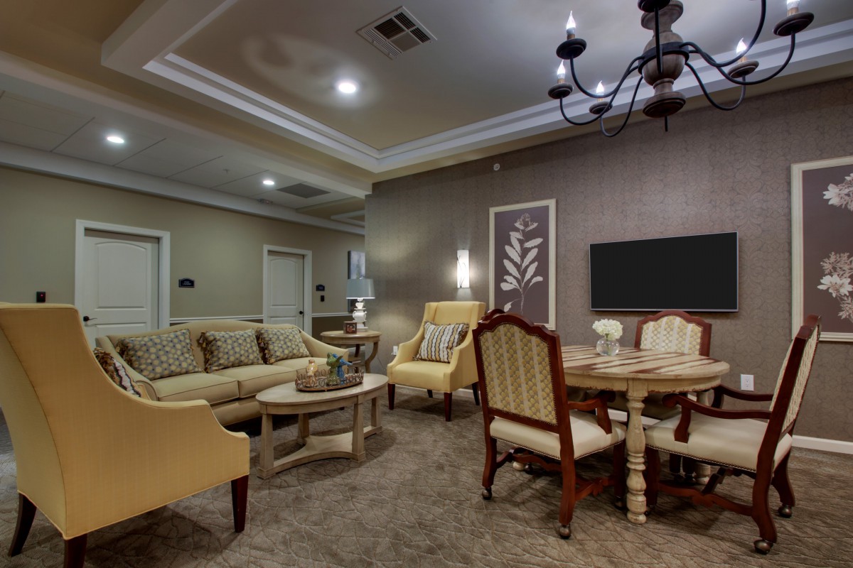 A cozy living room with classic furniture and elegant decor.