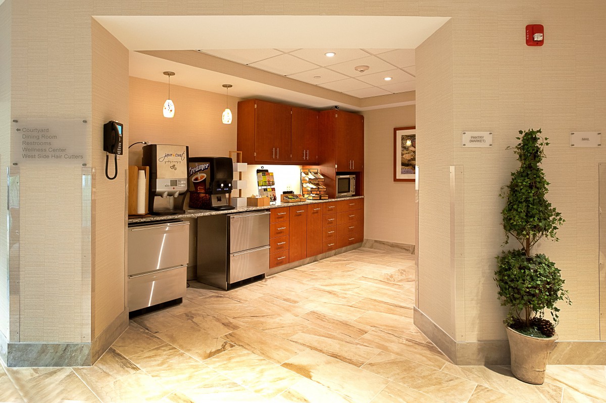 A modern kitchen interior with sleek cabinets and appliances.