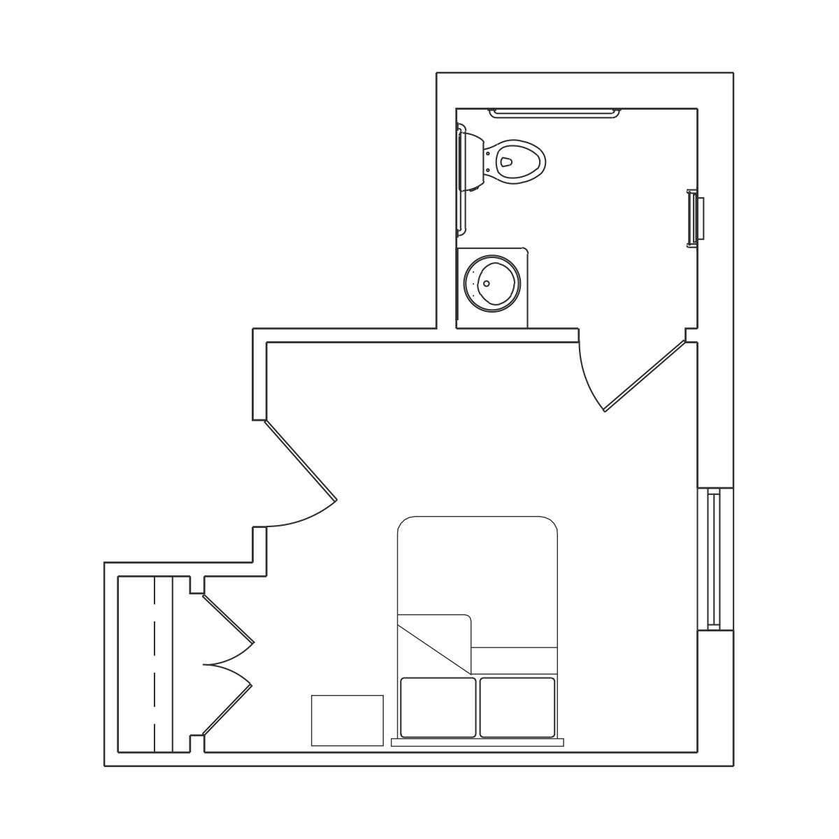 A floor plan of a compact apartment featuring a bathroom and bedroom area.