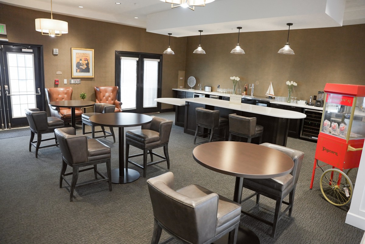 A modern lounge area with comfortable seating and ambient lighting.