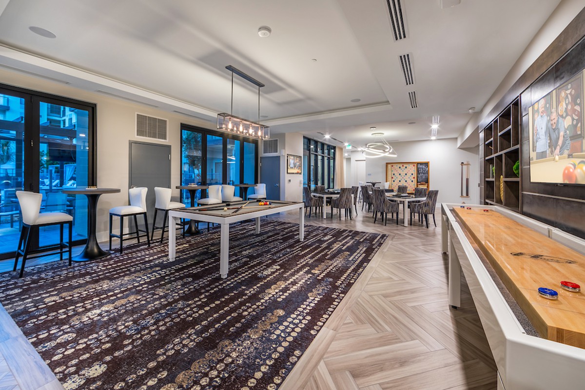 A modern and spacious dining area with elegant interior design.