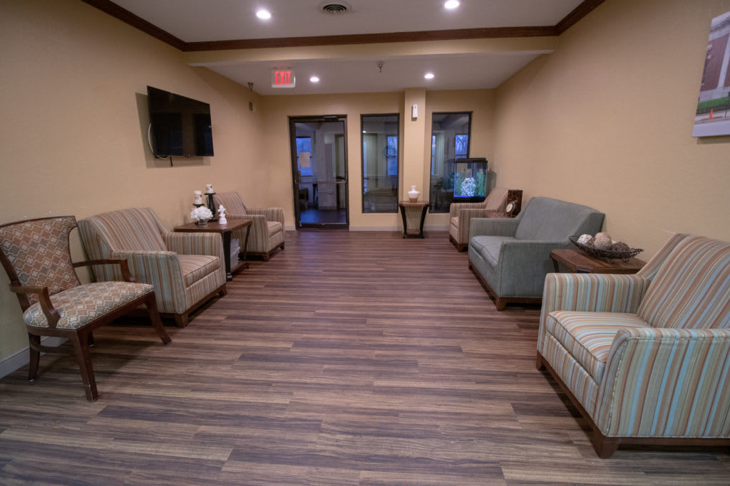 A well-organized waiting room with comfortable seating and modern decor.