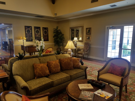 A cozy living room setup with comfortable seating and warm decor.
