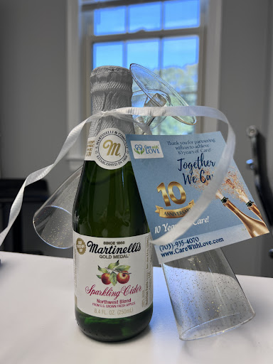A beautifully wrapped bottle of sparkling grape juice, perfect for celebrations.