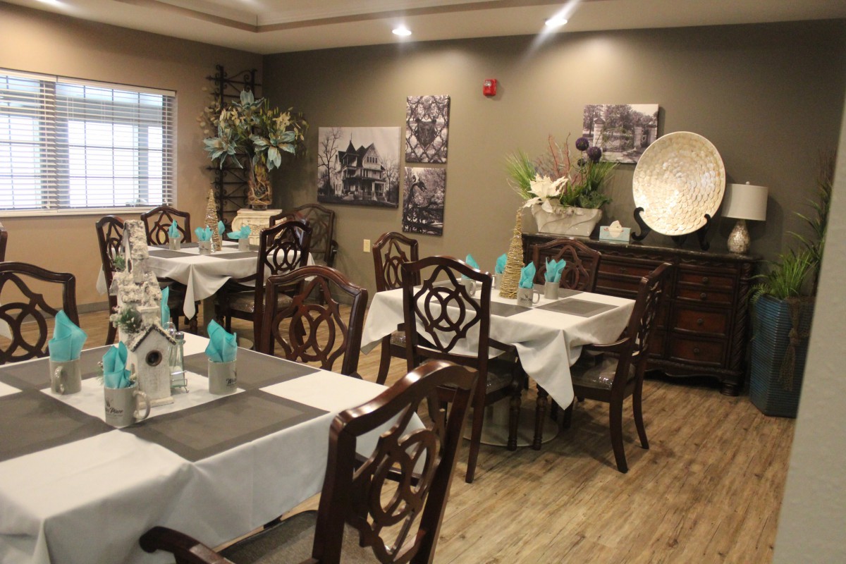 Elegant dining area with neatly set tables and classic decor.