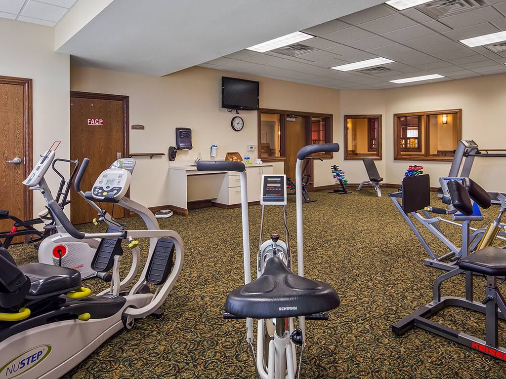 A well-equipped gym with exercise bikes and other fitness equipment.