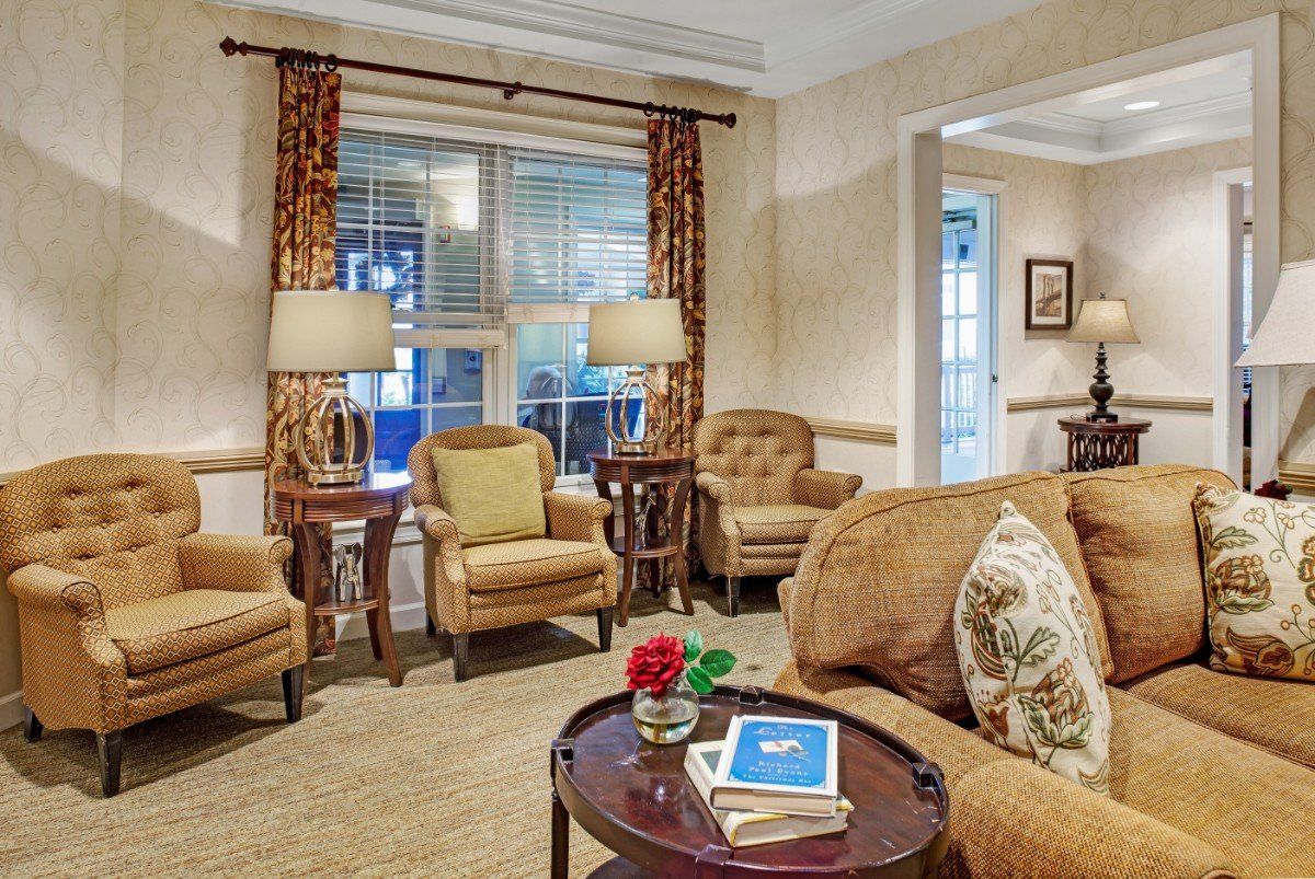 Cozy living room with comfortable seating and warm lighting.