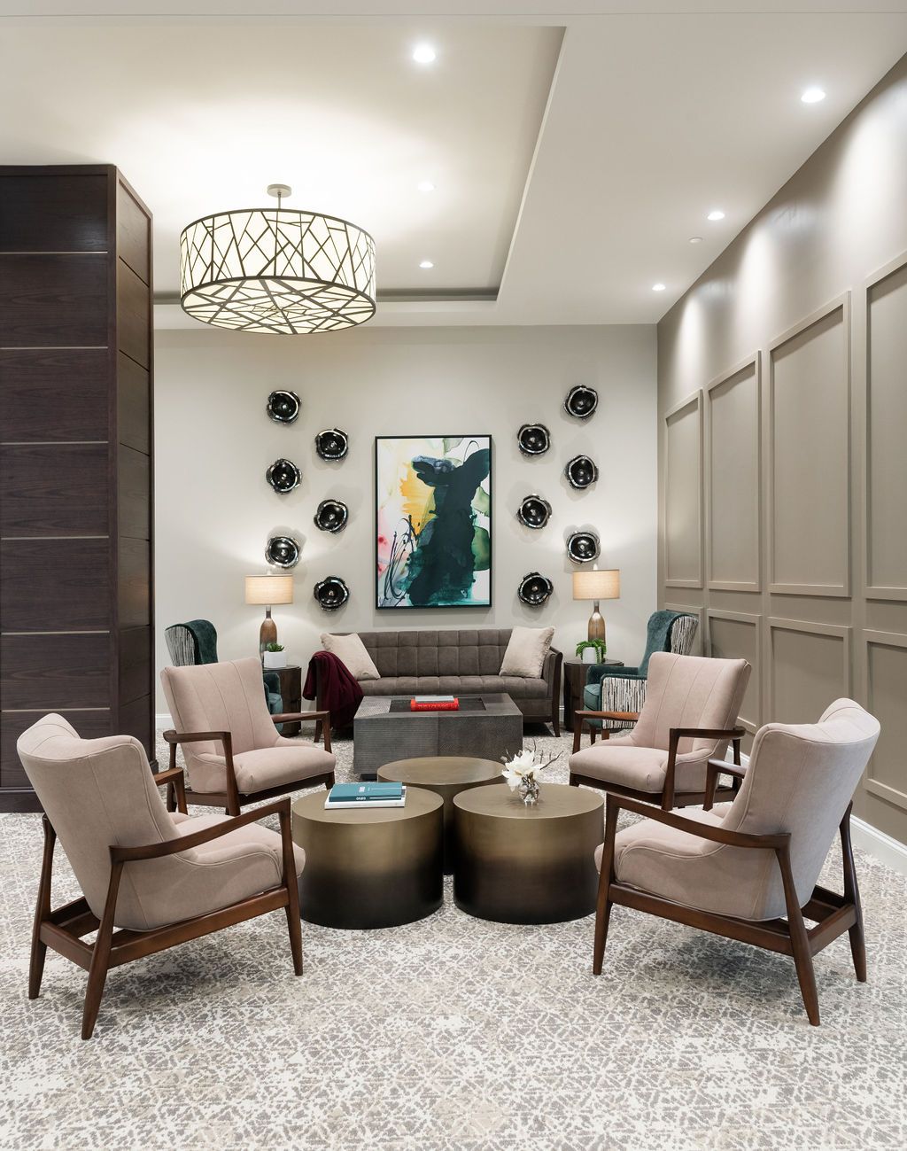 A modern and luxurious living room with stylish furniture and decor.