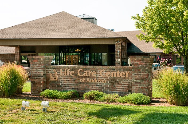 Entrance of the Life Care Center with visible signage and landscaping.
