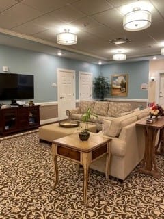 A cozy living room with comfortable seating and modern decor.