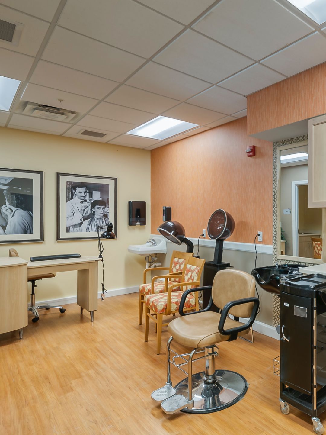 A well-equipped hair salon with chairs, mirrors, and styling stations.