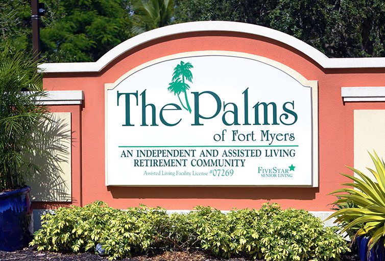 Sign for The Palms of Fort Myers, an independent and assisted living retirement community.