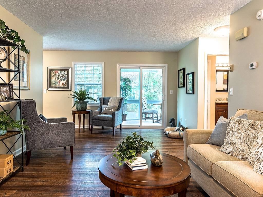 A cozy living room with comfortable seating and natural light.
