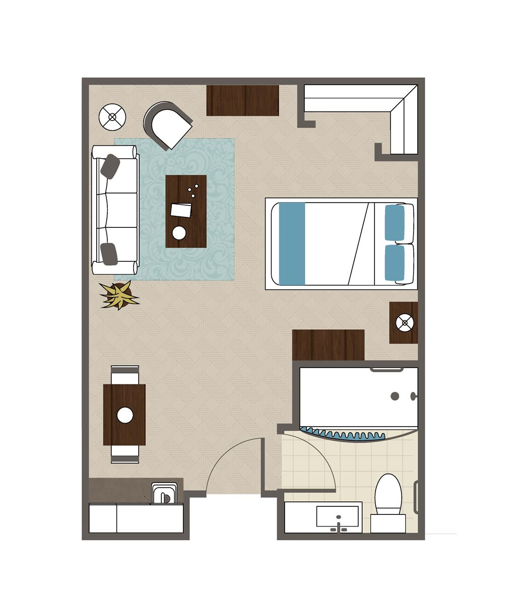 A studio apartment floor plan showcasing a compact living area, kitchen, bedroom, and bathroom layout.