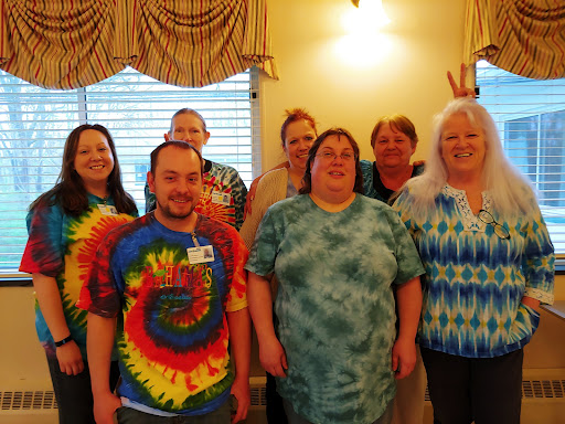 A cheerful group of friends gathered for a fun moment together.