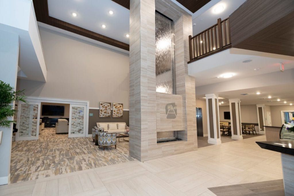 A modern and spacious lobby area featuring contemporary design elements and elegant furniture.