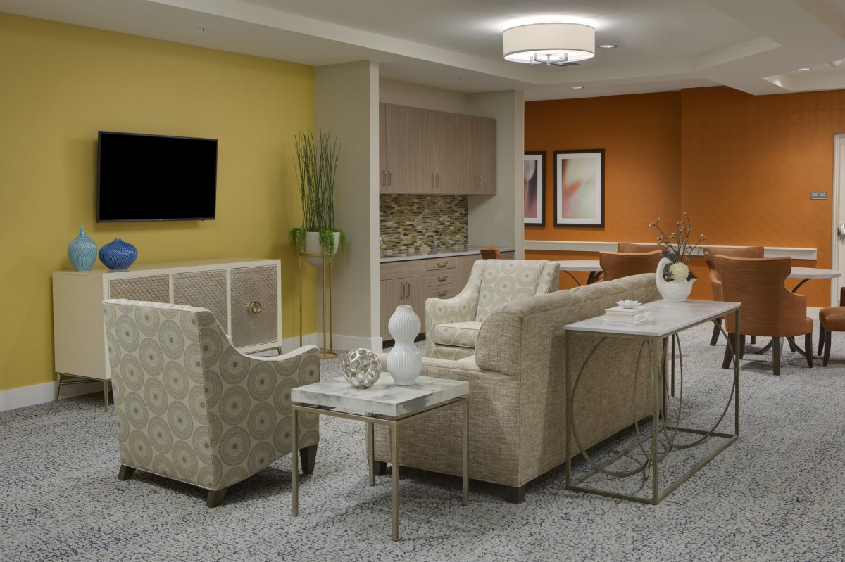 A modern living room with comfortable seating and stylish decor.