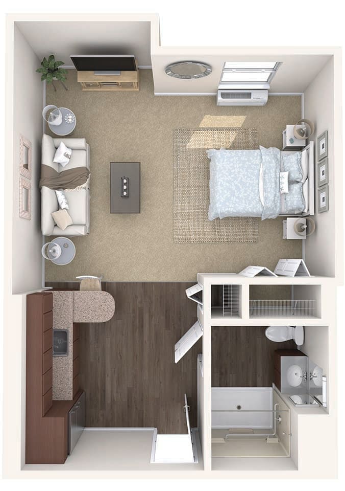 A top-view floor plan of a modern studio apartment featuring a combined living and bedroom area with a small kitchen and bathroom.
