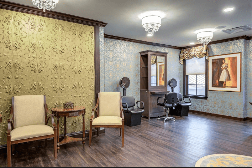 Elegant salon interior with comfortable seating and hair styling stations.