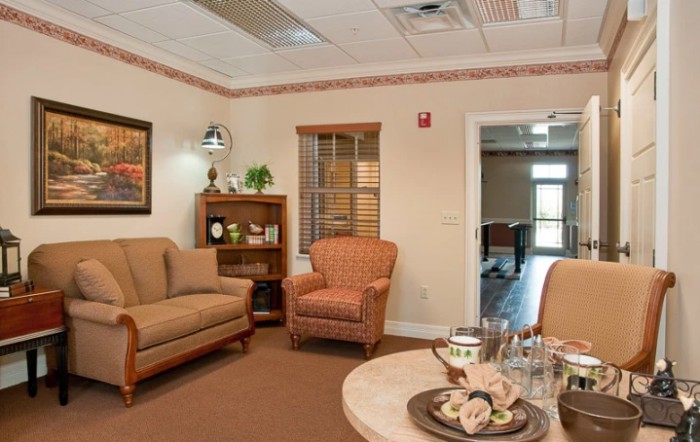 A cozy living room with comfortable seating and warm decor.