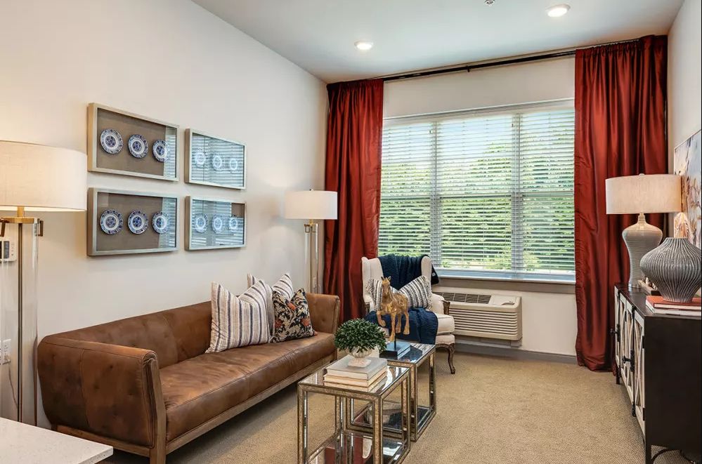 Cozy living room with modern decor and natural light.