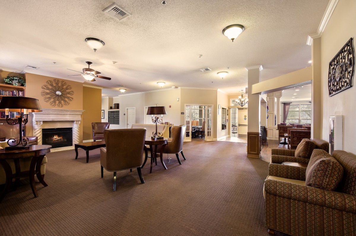 Spacious living area with comfortable seating and warm lighting.