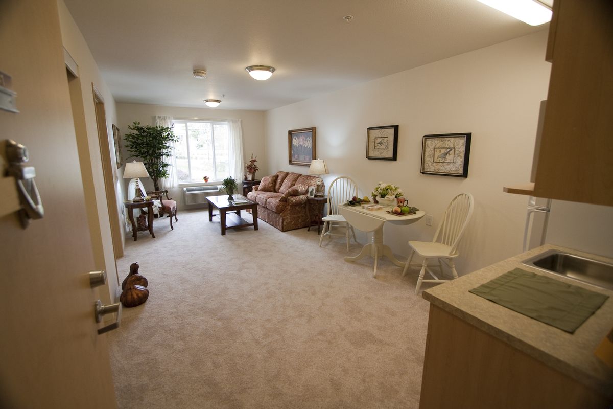 A cozy living room with comfortable furniture and soft lighting.