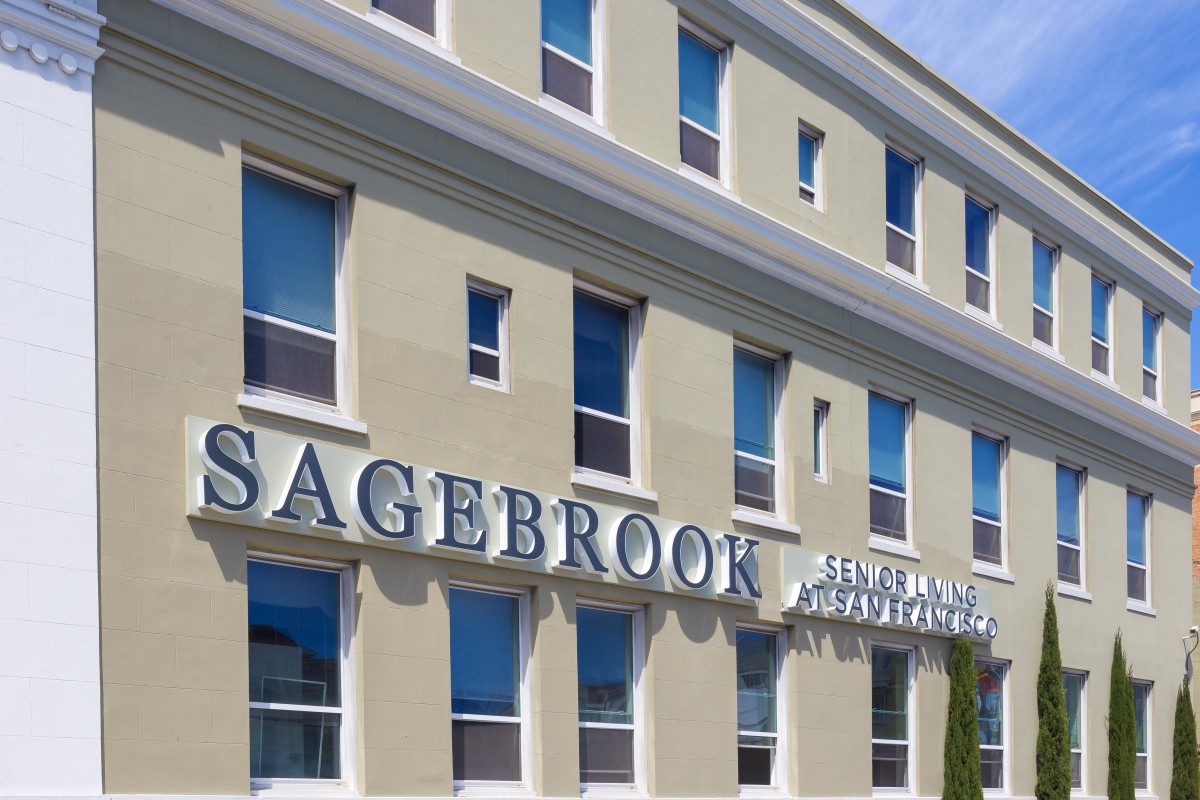 Exterior view of the Sagebrook building with prominent signage and multiple windows.
