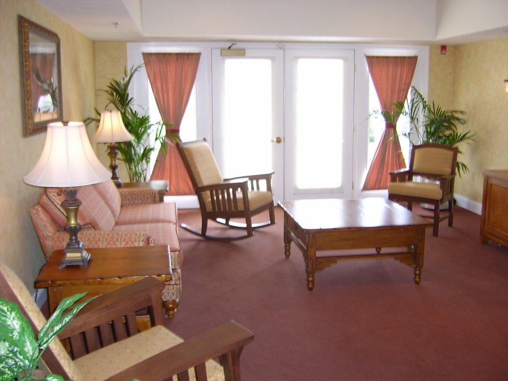 A cozy living room with comfortable seating and natural light.