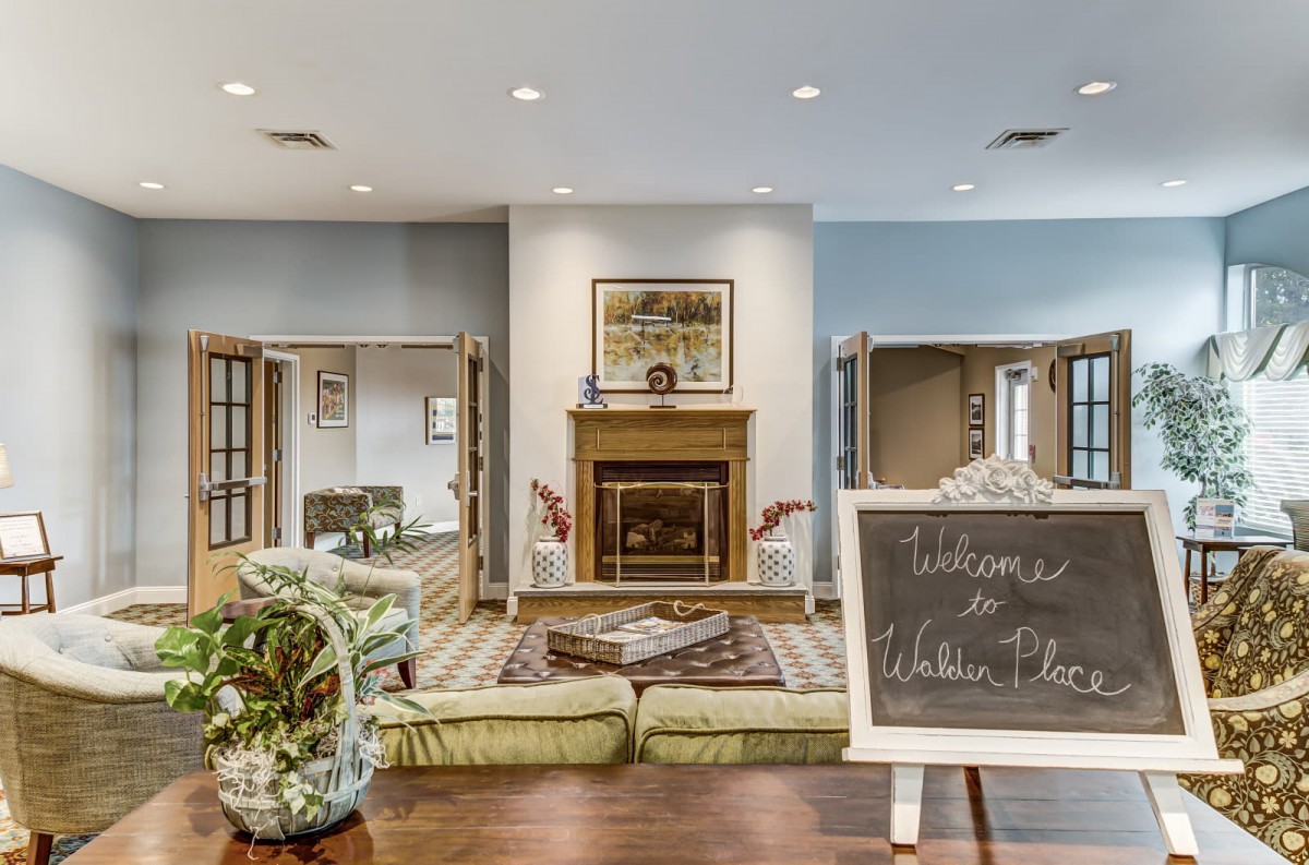 Cozy lobby with a warm fireplace and welcoming decor.