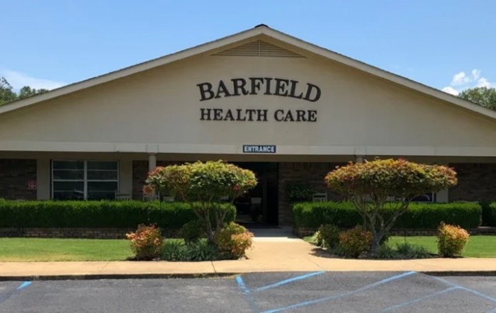 Front view of Barfield Health Care building with landscaped surroundings.