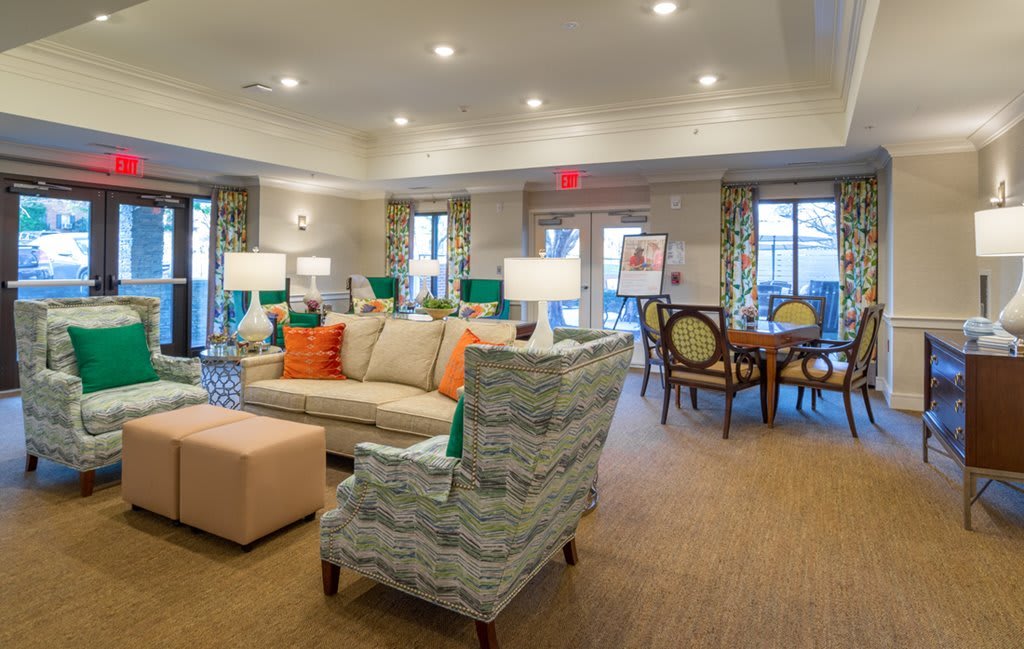 Spacious and elegantly designed living room with comfortable seating and a dining area.