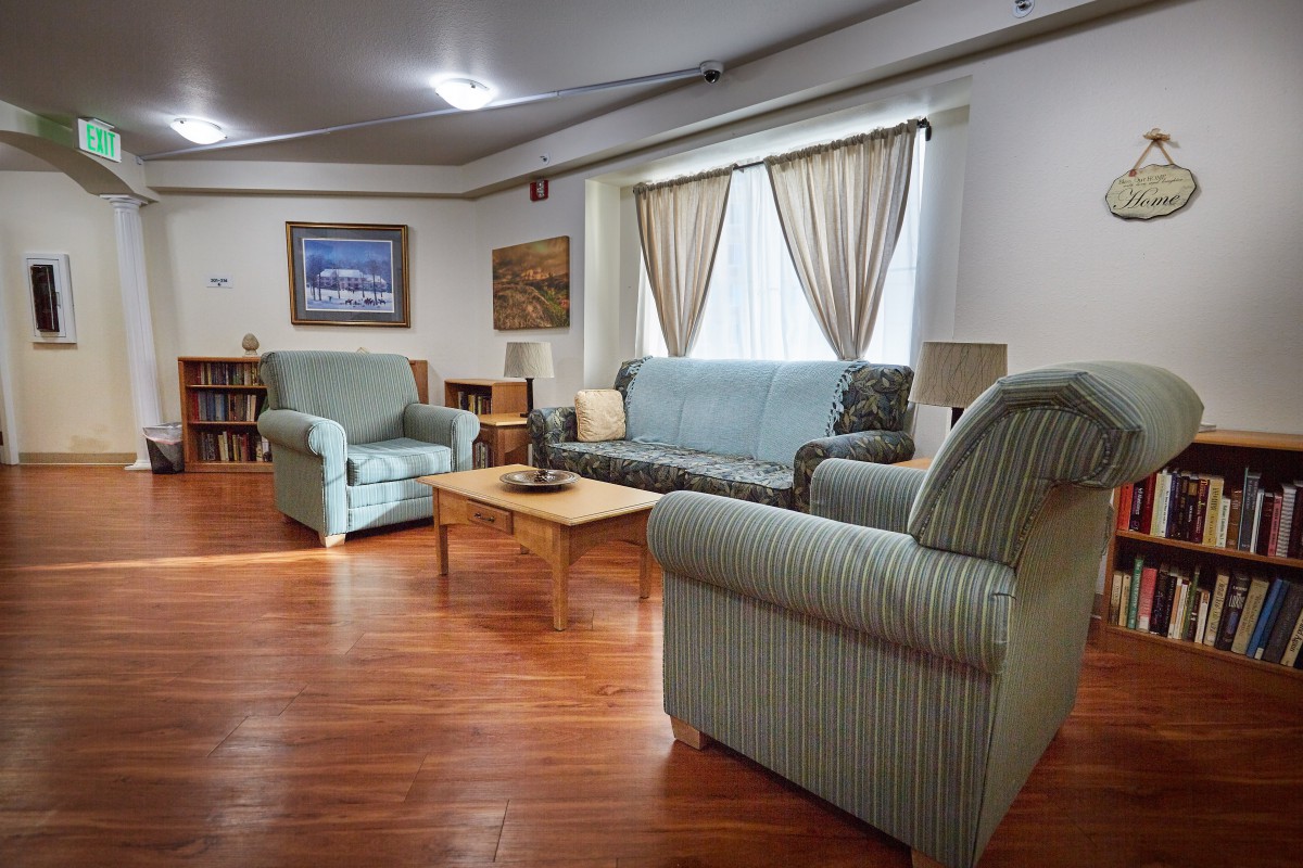 A cozy living room with comfortable seating and warm decor.